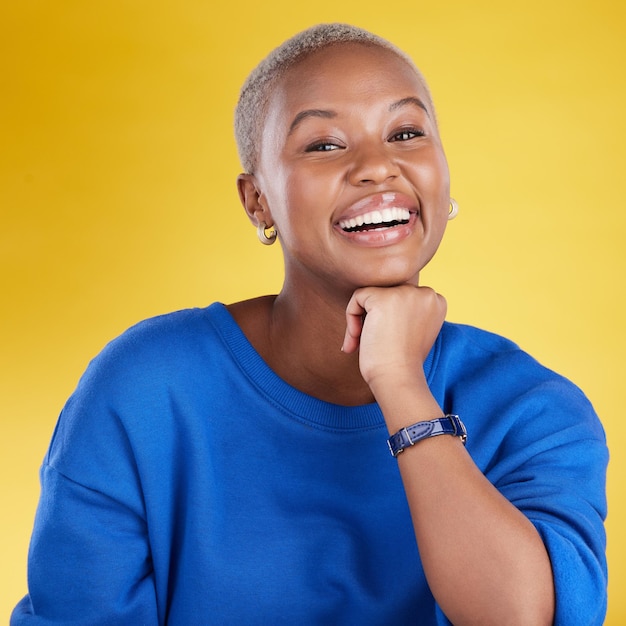 Black woman studio portrait and happy student for confidence beauty and yellow background Girl model smile and fashion with excited face cosmetics or gen z aesthetic with happiness by backdrop