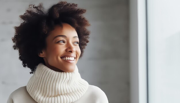 Black woman with Afro curls in a warm sweater in the park