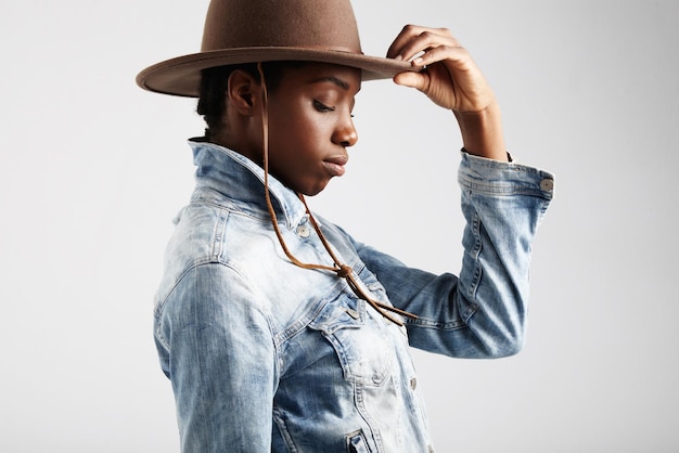 Black womans profile in hat