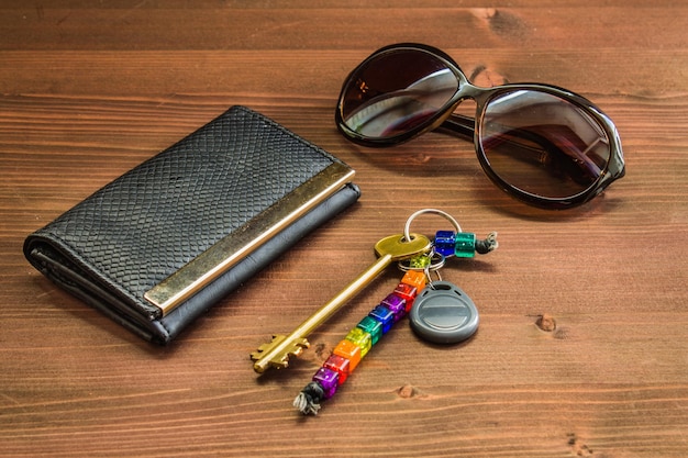 Black women's purse on a wooden background