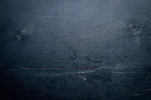 Foto sfondo di legno nero vista dall'alto spazio libero per il testo