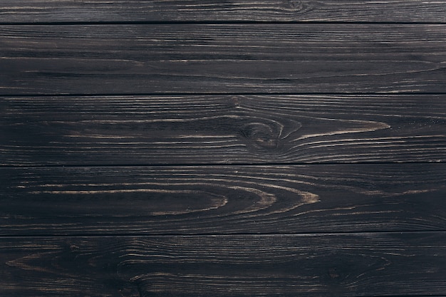 Photo black wooden background.