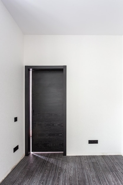 Black wooden door in dark style color for modern interior and apartments flat or office