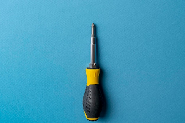 A black and yellow screwdriver isolated repair tool equipment