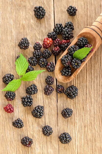 Blackberries on rustic wooden table