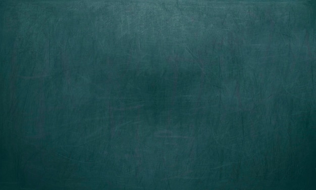 Blackboard / chalkboard texture. Empty blank 
blue chalkboard with chalk traces