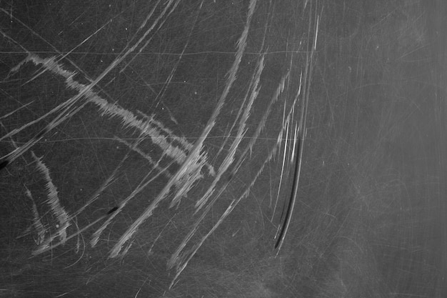 Blackboard texture with scratches and wet chalk traces