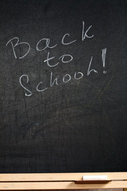 Photo blackboard texture with text back to school