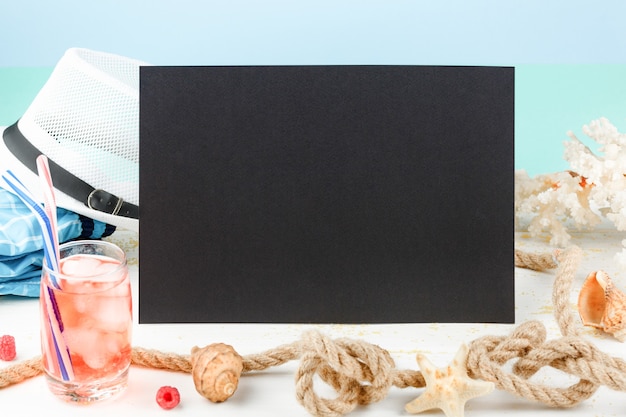 Blackboard with beach summer accessories