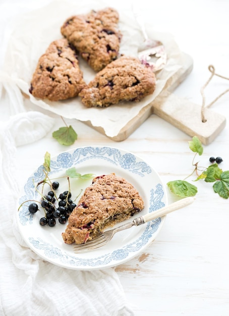 Blackcurrant scone bisquits with fresh garden berries top view