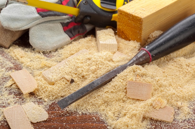 Blade of sharp chisels with sawdust