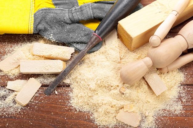 Blade of sharp chisels with sawdust