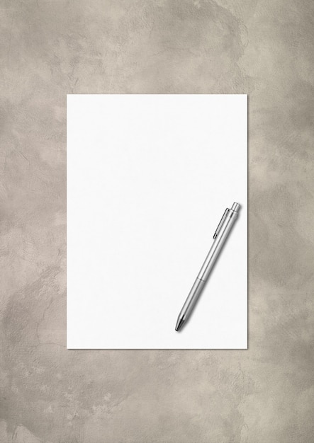 Photo blank a4 paper sheet and pen mockup template isolated on concrete background