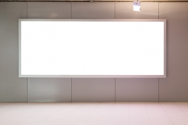 blank advertising billboard at baggage claim in the airport