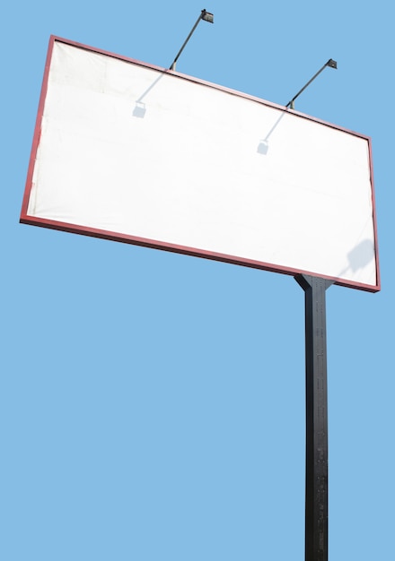 Photo blank advertising billboard isolated on blue surface