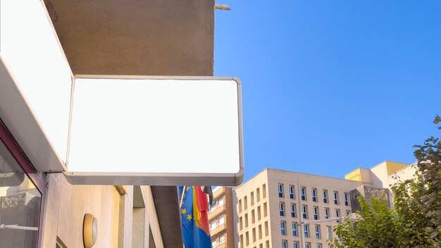 Blank advertising board in city Mockup for design