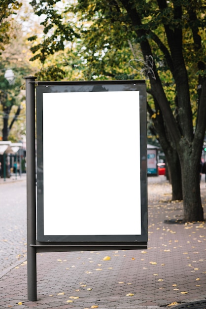 Photo blank advertising panel on pavement