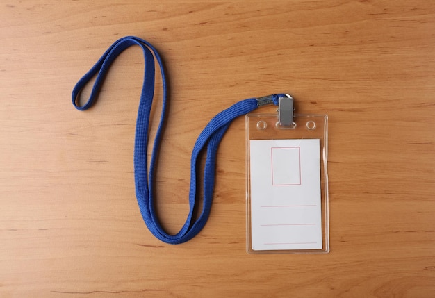 Blank badge on wooden table