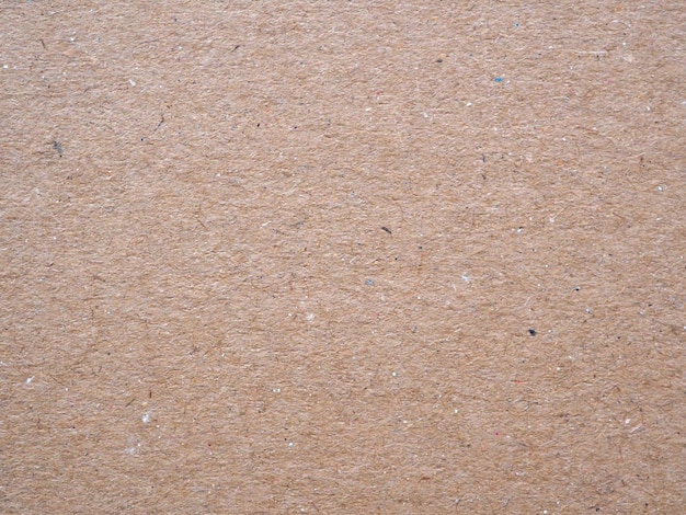 Blank beige cardboard fiber texture or background