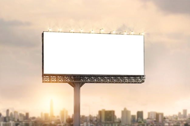 Blank billboard for advertisement on city sunset background