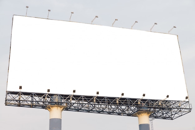 Photo blank billboard at blue sky background, mock up