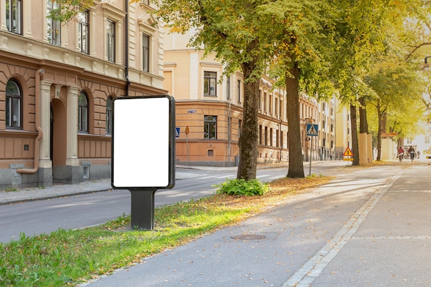 Blank billboard mock up on city road for text message or
content.