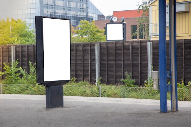 Blank billboard mock up on city for text message or\
content.