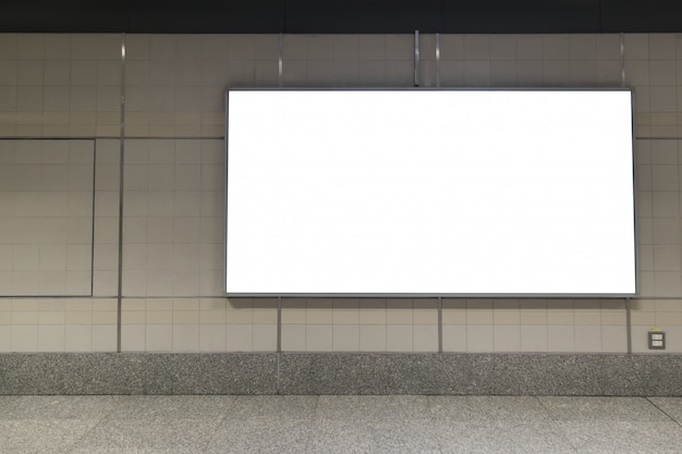 Photo blank billboard posters in the subway station for advertising.