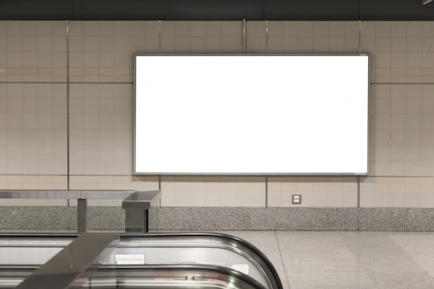 Photo blank billboard posters in the subway station for advertising.