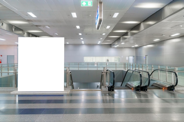 Blank billboard on subway station