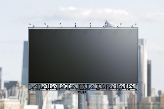 Blank black billboard on cityscape background front view Mock up advertising concept