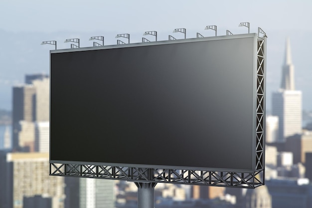 Blank black billboard on cityscape background perspective view\
mock up advertising concept
