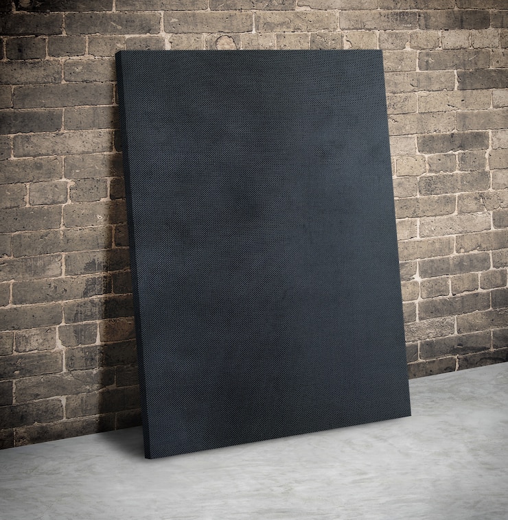 Photo blank black fabric poster on the grunge brick wall