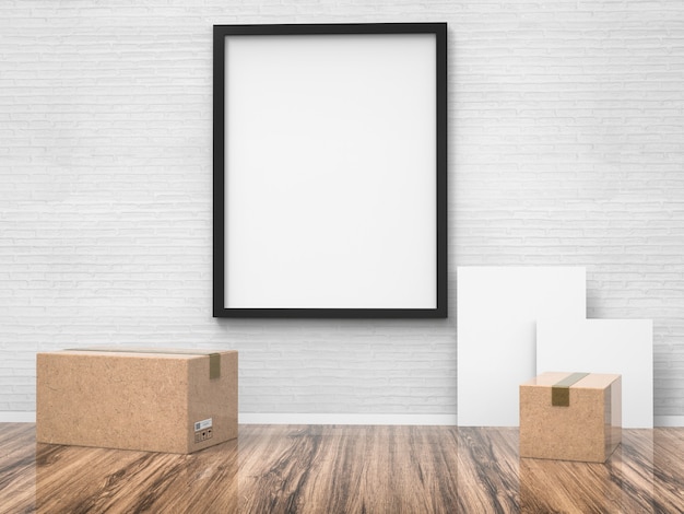 Blank black frame hanging on wall with carton box