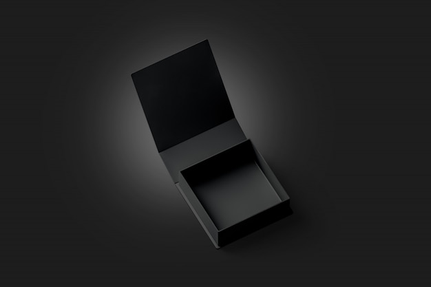 Blank black opened gift box , isolated in darkness