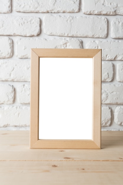 Blank black picture frame on the wall