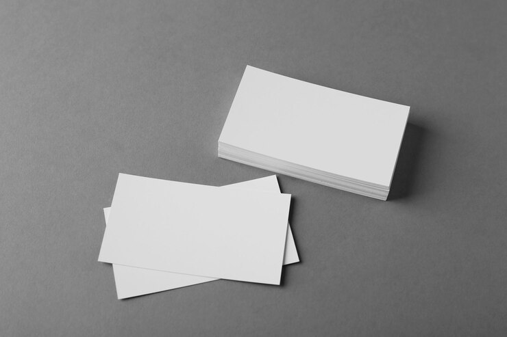 Photo blank business cards on grey background