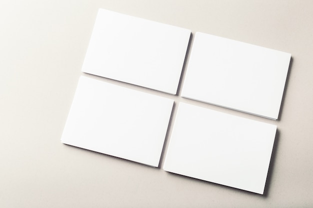 Blank business cards on grey 