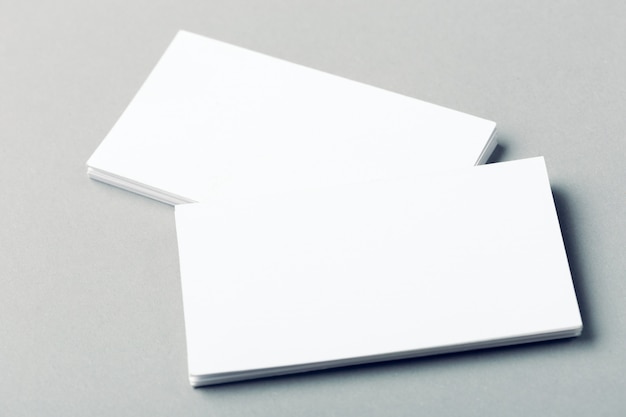 Blank business cards on grey 