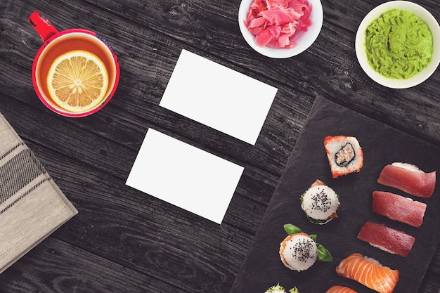 Photo blank business cards in a sushi bar scene