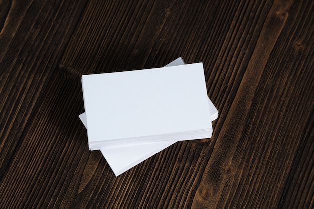 Blank business cards on wood