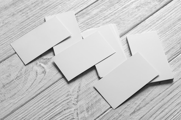 blank business cards on wooden background