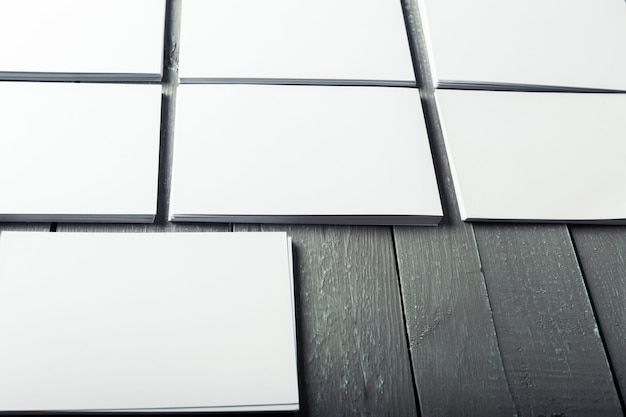 Blank business cards on a wooden table