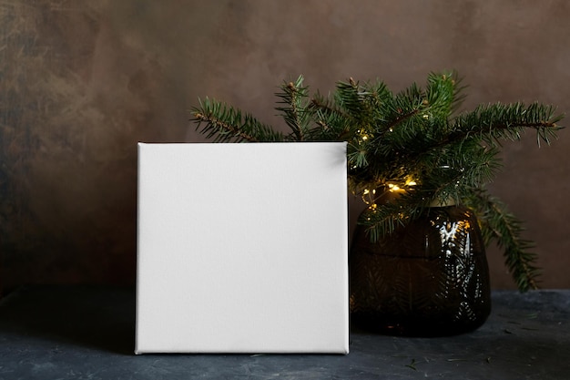 Blank canvas and Christmas tree twigs