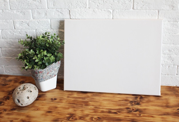 Photo blank canvas or mockup poster frame