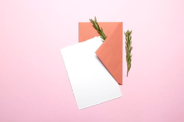 Blank card and envelope with rosemary