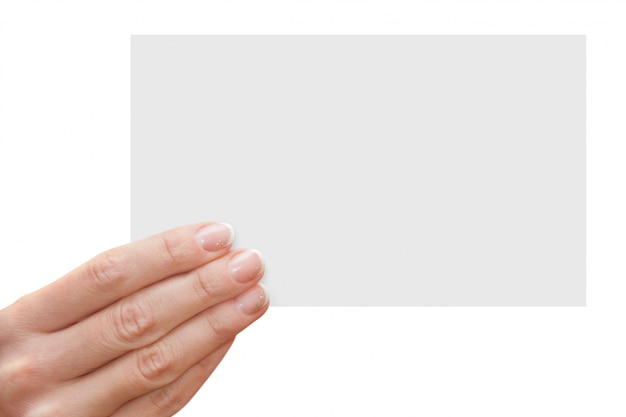 Blank card in hand isolated on white