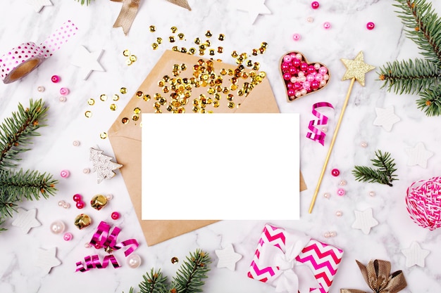 Blank card with golden streamers and sparkles. holiday mockup. Christmas concept. Flat lay, top view