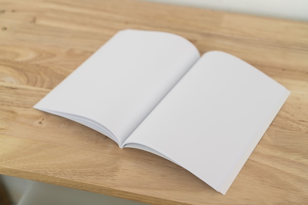 Blank catalogues on wooden table