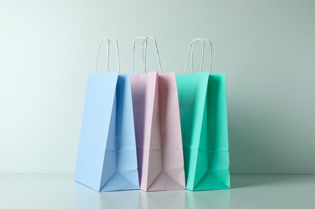 Blank colorful paper bags on white background